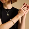 Heritage Pearl D-Link guldfärgat armband i rostfritt stål