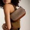 Jolie liten crossbody-väska i läder Jolie liten crossbody-väska i läder