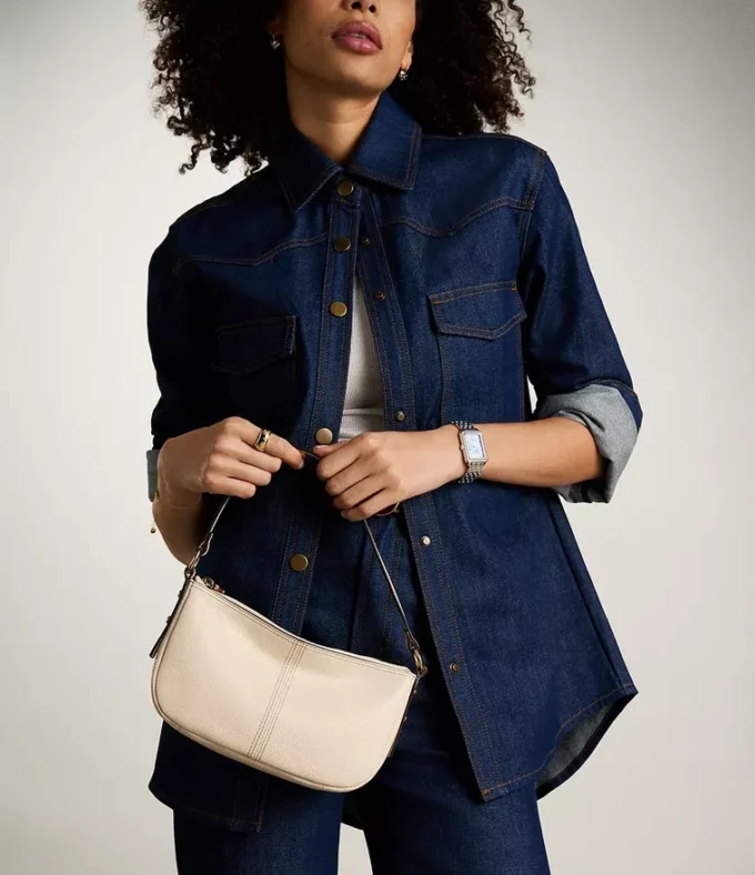 Jolie liten crossbody-väska i läder Jolie liten crossbody-väska i läder