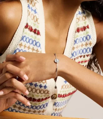 Merrit tidlöst armband med pärlemor och silverfärgat rostfritt stål