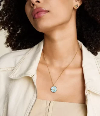 Pisces Sutton Zodiac guldfärgat rostfritt stål halsband med grönt pärlemorhänge